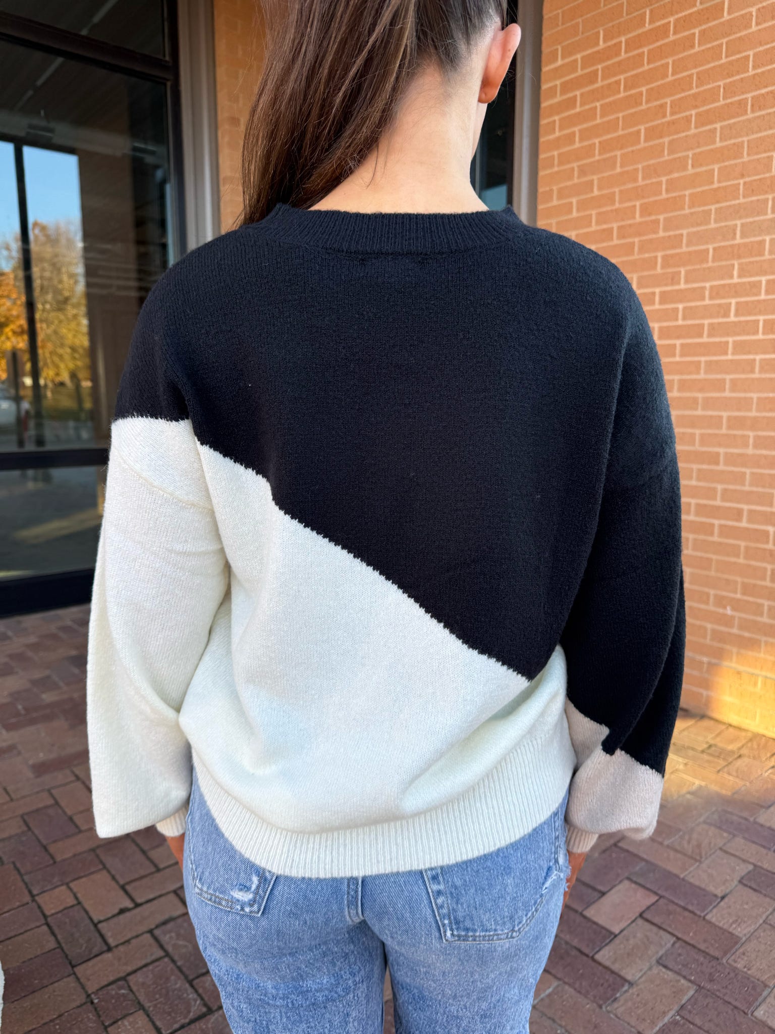 ASYMMETRICAL KNIT SWEATER