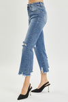 HIGH RISE UNEVEN HEM JEANS