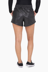 GLOSSY LEATHER SHORTS