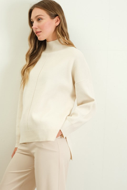 MOCK NECK FRONT SEAM SWEATER