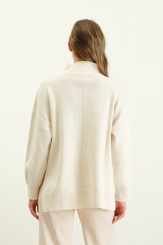 MOCK NECK FRONT SEAM SWEATER