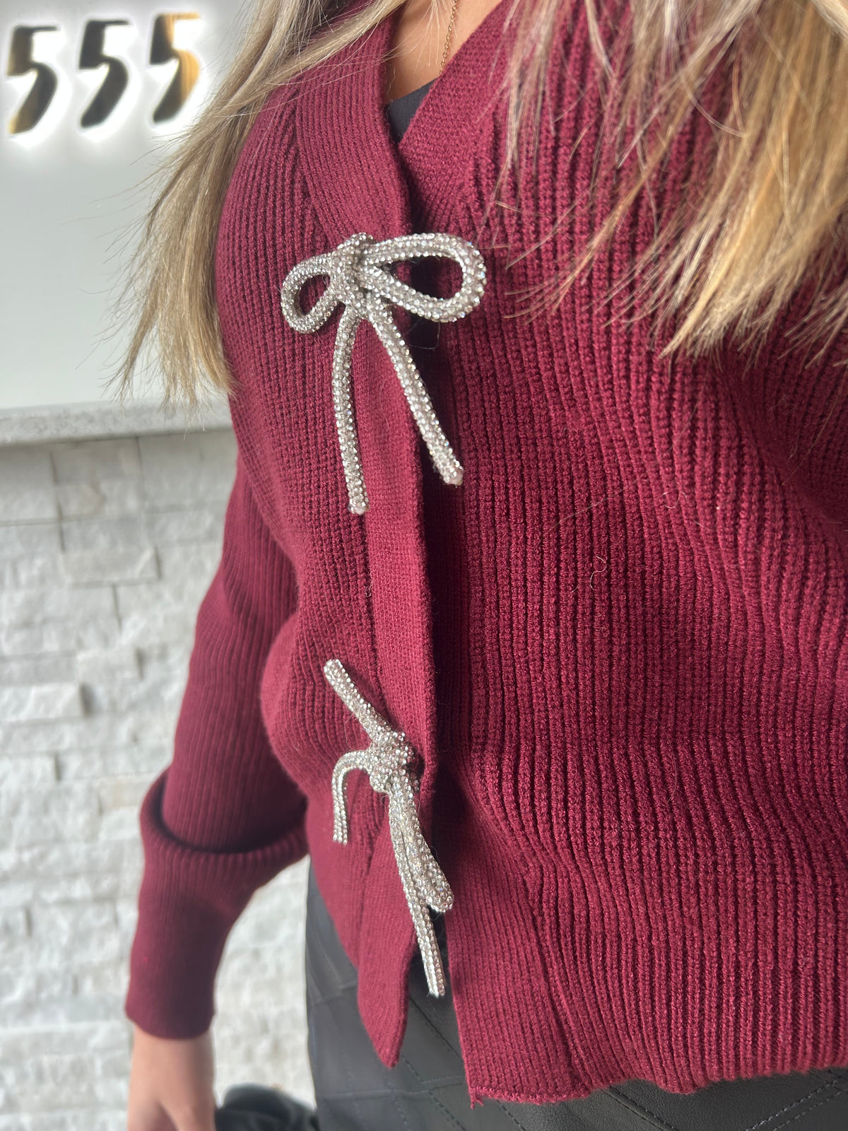 KNIT CARDIGAN WITH JEWELED BOW