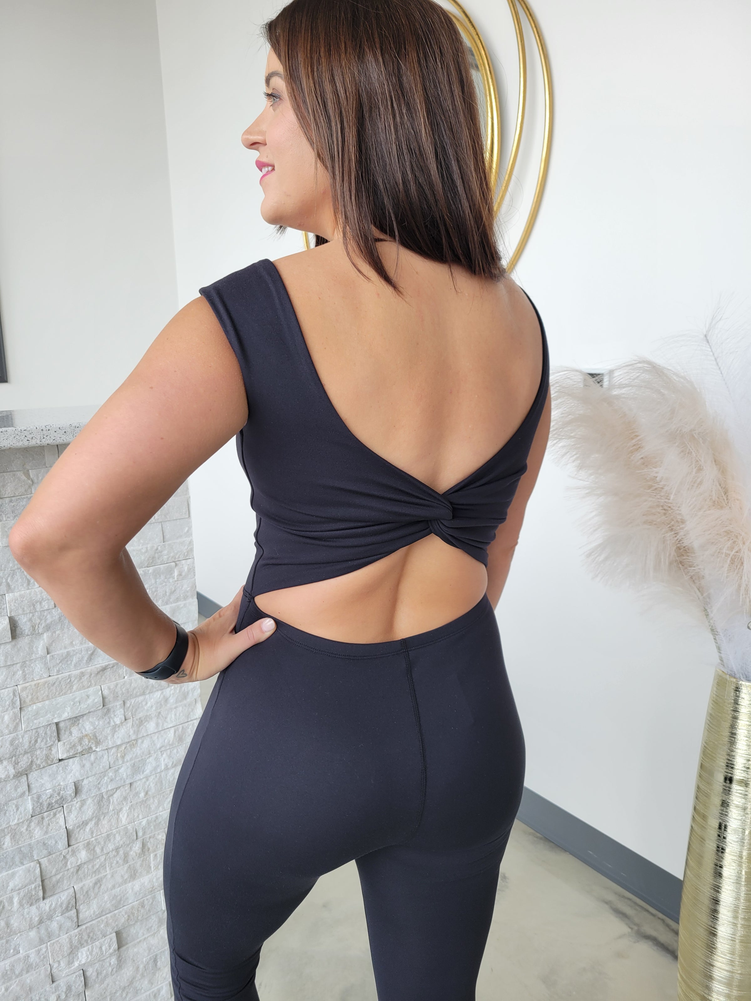 TWISTED BACK FLARE JUMPSUIT