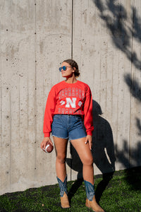 NEBRASKA HUSKERS DOUBLE HELMET CREWNECK