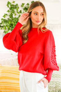 RED BUBBLE SLEEVED SWEATER