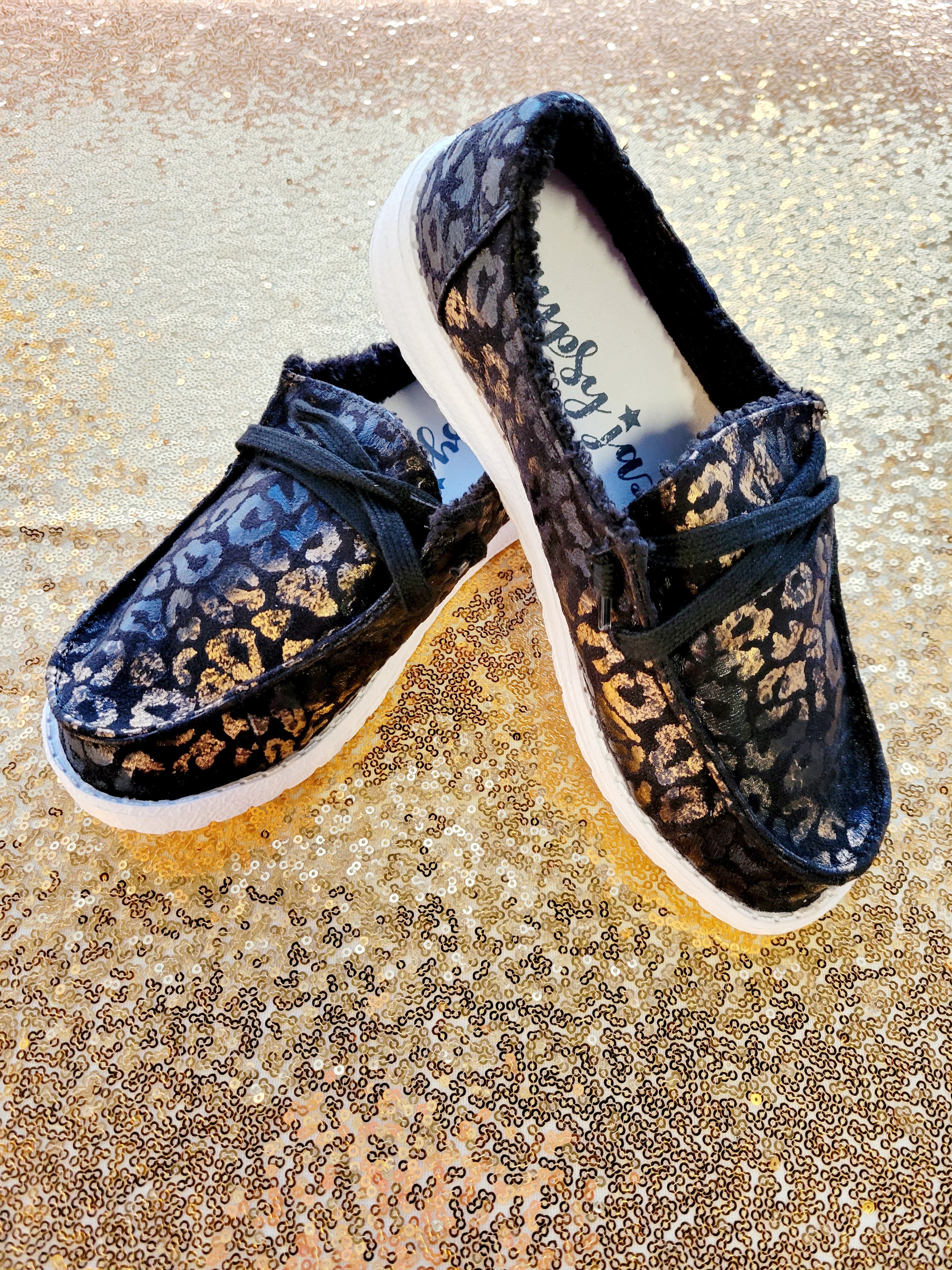 BLACK METALLIC LEOPARD SLIP ON CANVAS SHOE