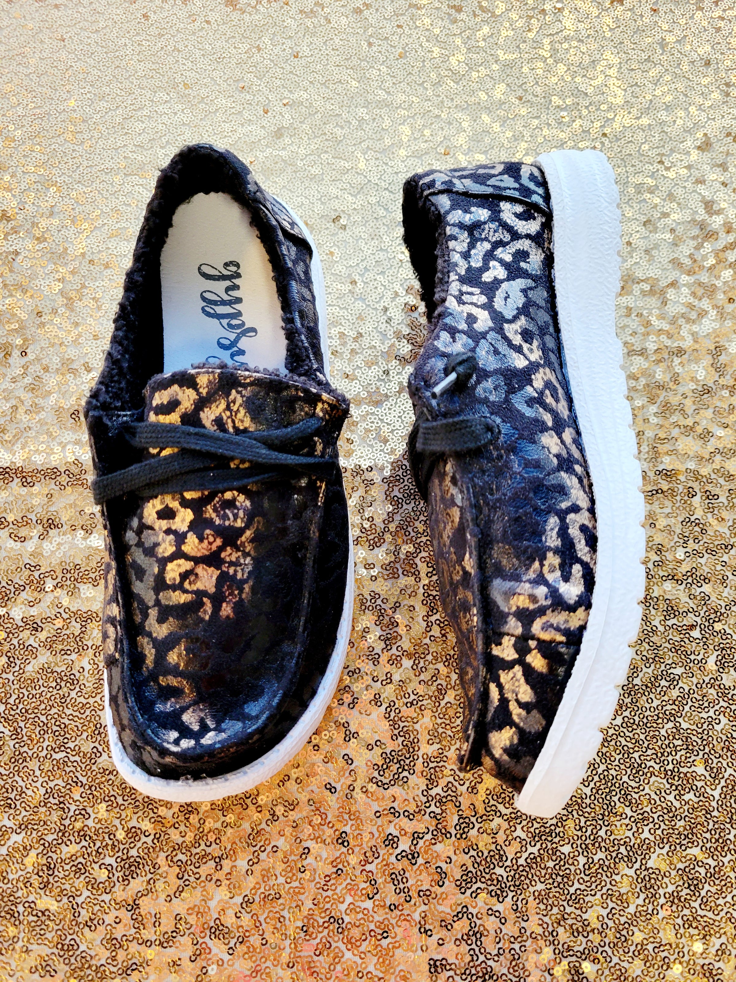 BLACK METALLIC LEOPARD SLIP ON CANVAS SHOE