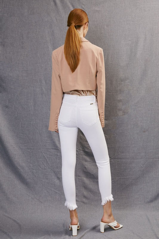 White skinny jeans hot sale with frayed hem